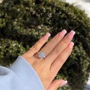 5.5 emerald cut lab IGI diamond center in 14k engagement ring size 6